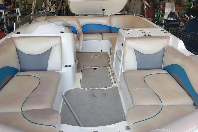 Slide: The Image of 2009 Hurricane FunDeck GS 202 I/O boat interior with spacious seating and cup holders. - 8