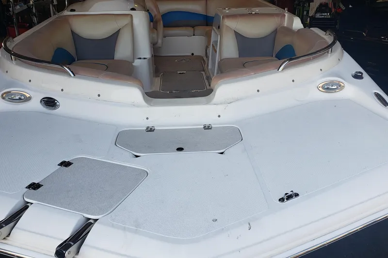Slide: The Image of 2009 Hurricane FunDeck GS 202 I/O boat interior with spacious seating and storage compartments. - 9