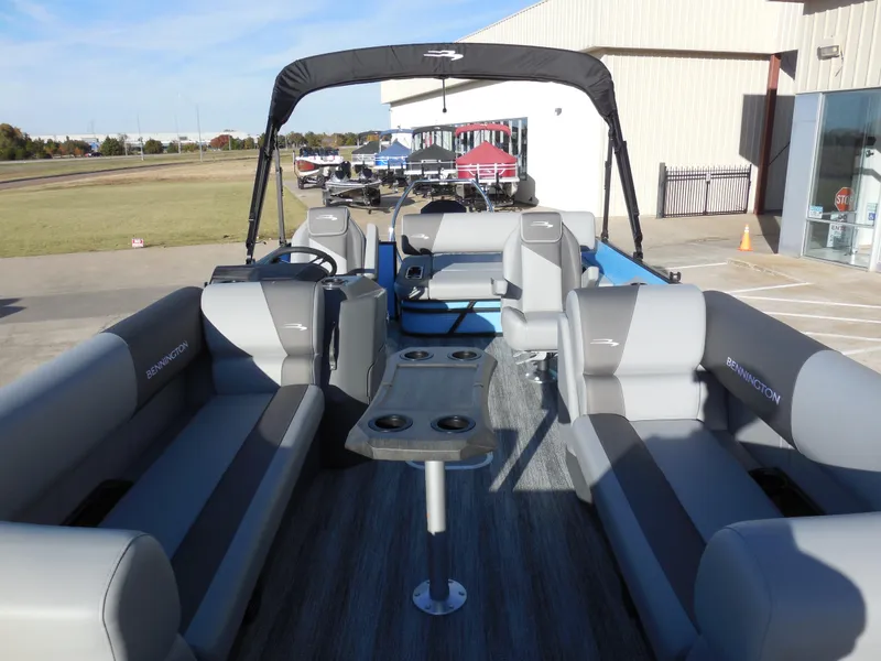 Slide: The Image of 2025 Bennington 22 SSB pontoon boat with spacious seating and modern design. - 6