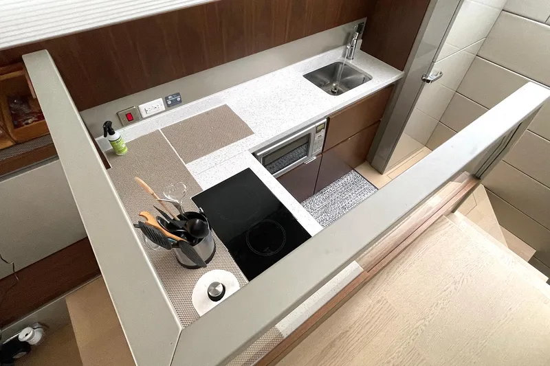Slide: The Image of Modern kitchen in 2015 Fairline Targa 62 GT yacht with sleek design and appliances. - 13