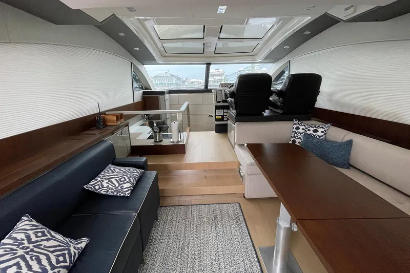 Slide: The Image of Luxurious interior of 2015 Fairline Targa 62 GT yacht with modern seating and decor. - 17