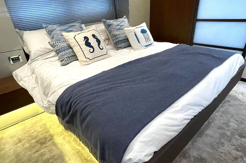 Slide: The Image of Luxurious bedroom interior of 2015 Fairline Targa 62 GT yacht with stylish bedding. - 7