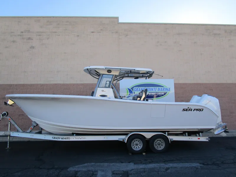 The Image of 2025 Sea Pro 292 Offshore boat on trailer at Grand Pointe Marina. - 0