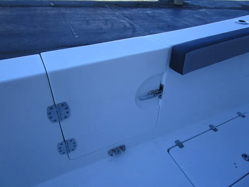 Slide: The Image of 2025 Sea Pro 292 Offshore boat interior detail with hinges and seating. - 14