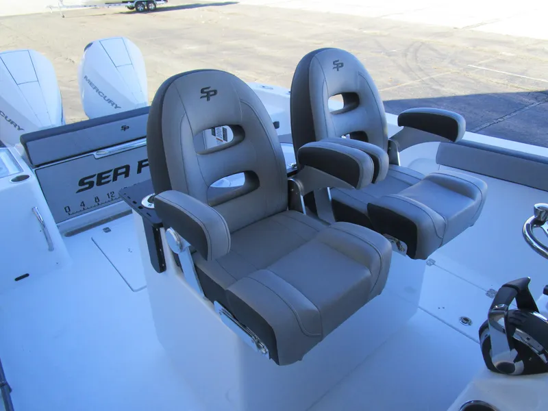 Slide: The Image of 2025 Sea Pro 292 Offshore boat seats, gray leather, dual armrests, modern design. - 16