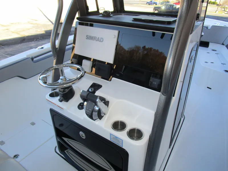 Slide: The Image of 2025 Sea Pro 292 Offshore boat console with Simrad navigation system. - 19