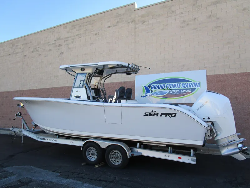 Slide: The Image of 2025 Sea Pro 292 Offshore boat on trailer at Grand Pointe Marina. - 2