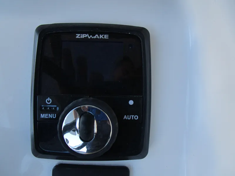 Slide: The Image of Zipwake control panel on 2025 Sea Pro 292 Offshore boat. - 21
