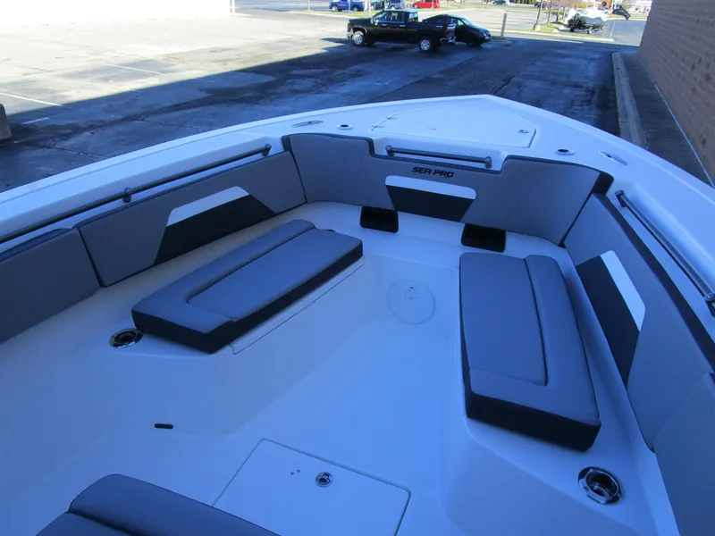 Slide: The Image of 2025 Sea Pro 292 Offshore boat interior with cushioned seating. - 27