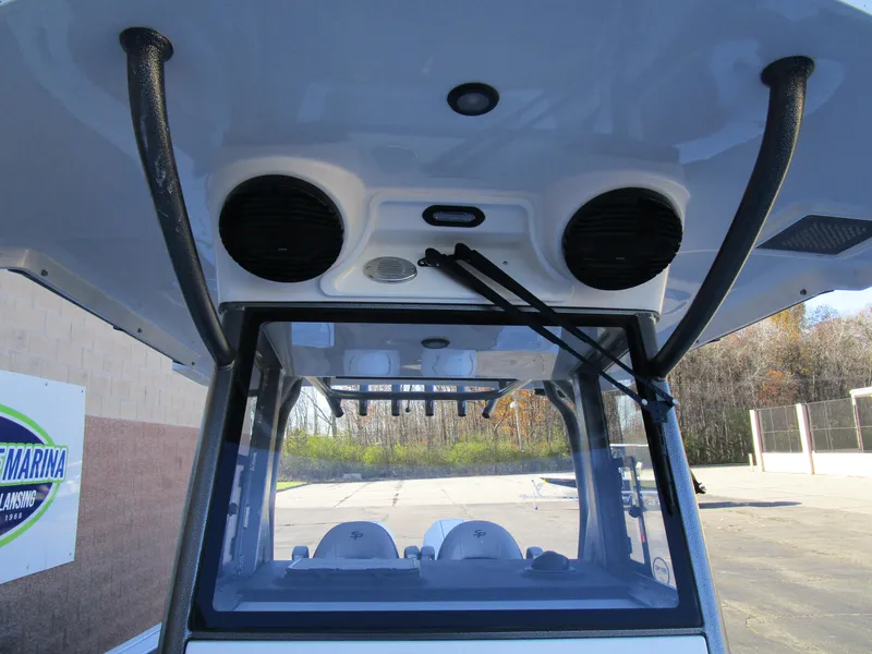 Slide: The Image of 2025 Sea Pro 292 Offshore boat console with speakers and windshield wipers. - 29