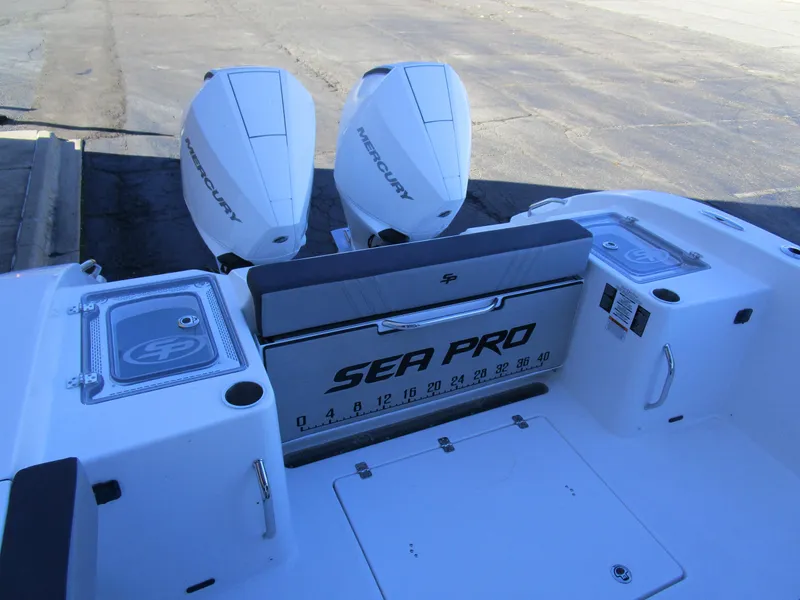 Slide: The Image of 2025 Sea Pro 292 Offshore boat with dual Mercury engines, rear deck view. - 7