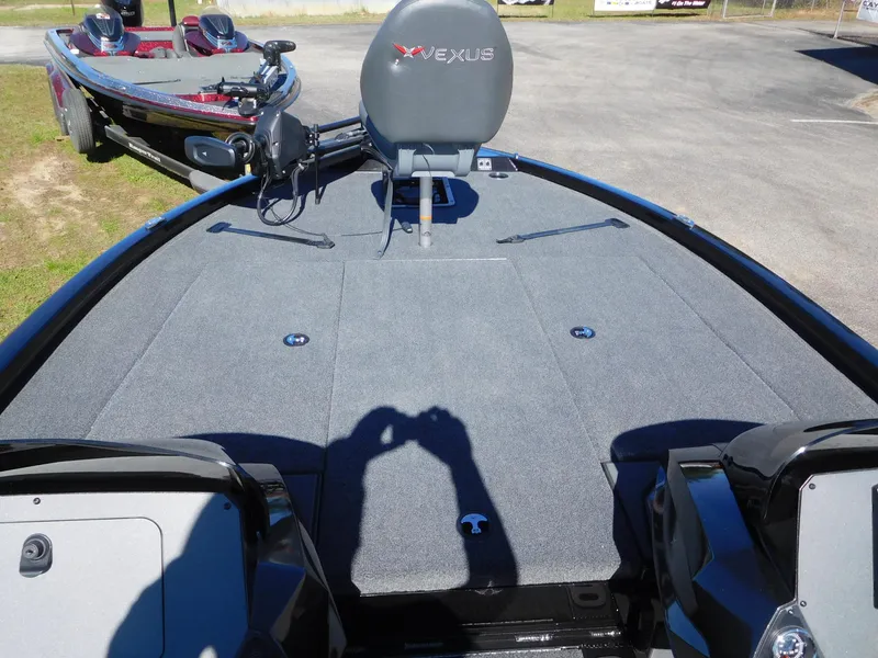 Slide: The Image of 2025 Vexus AVX 1985s boat deck with seating and storage compartments. - 4