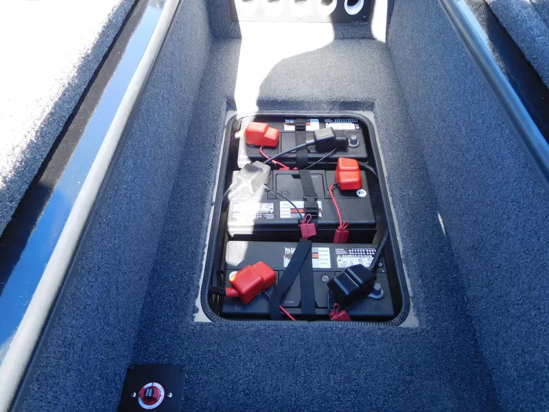 Slide: The Image of 2025 Vexus AVX 1985s boat battery compartment with dual batteries. - 6