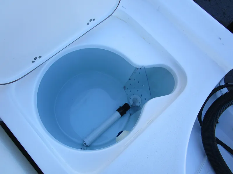 Slide: The Image of Livewell compartment in 2025 Sea Pro 230 Bay boat. - 11