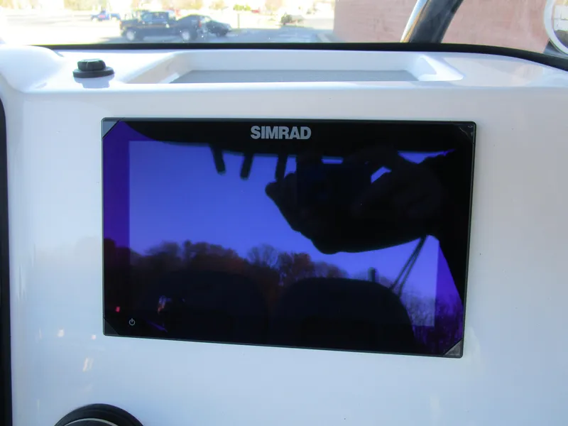 Slide: The Image of Simrad display on 2025 Sea Pro 230 Bay boat dashboard. - 16