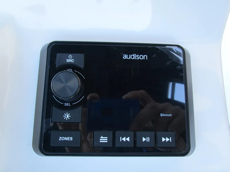 Slide: The Image of Audison audio control panel on 2025 Sea Pro 230 Bay boat. - 17