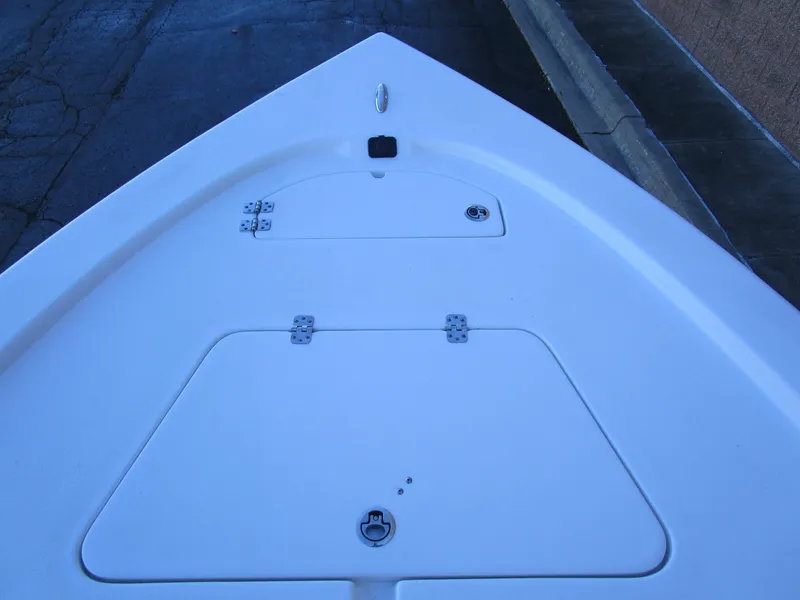 Slide: The Image of 2025 Sea Pro 230 Bay boat deck with storage compartments. - 22