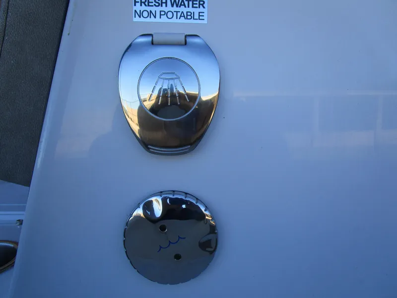 Slide: The Image of 2025 Sea Pro 230 Bay boat, non-potable fresh water access panel. - 24