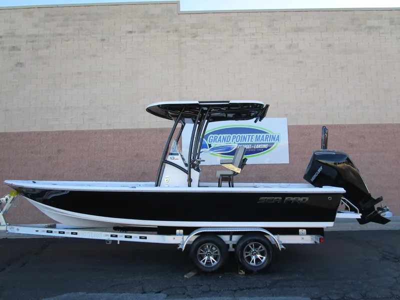 Slide: The Image of 2025 Sea Pro 230 Bay boat on trailer at Grand Pointe Marina. - 4