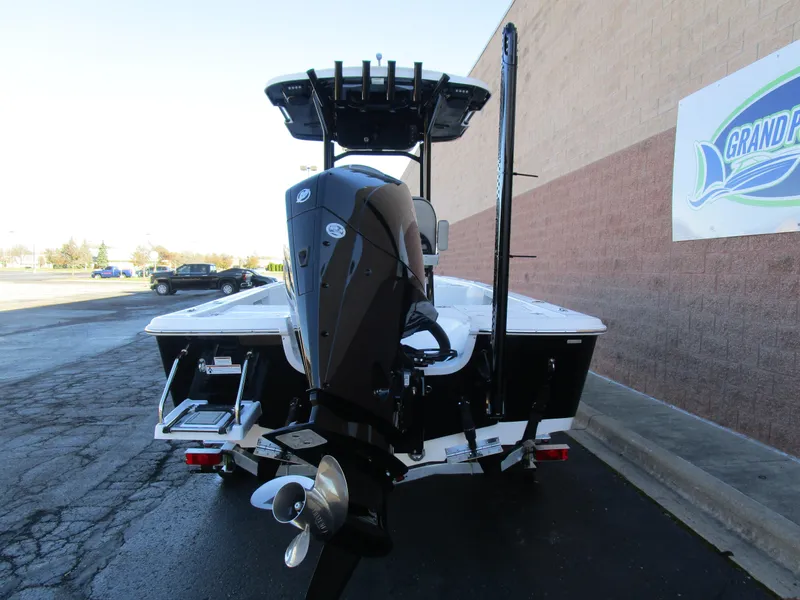 Slide: The Image of 2025 Sea Pro 230 Bay boat, rear view, parked outdoors. - 6