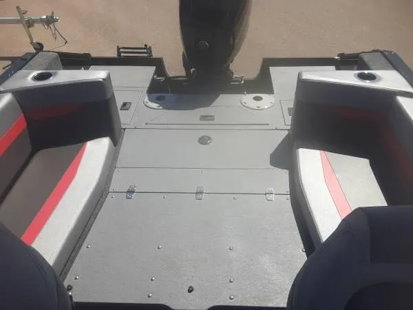 Slide: The Image of 2024 Princecraft Sport 175 MAX boat interior with seating and motor. - 12