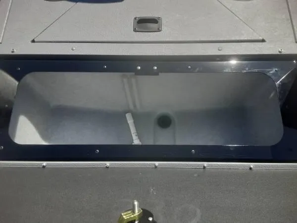 Slide: The Image of 2024 Princecraft Sport 175 MAX boat storage compartment, open and empty. - 13