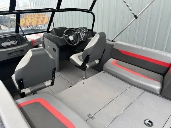 Slide: The Image of 2024 Princecraft Sport 175 MAX boat interior with gray and red seating. - 3