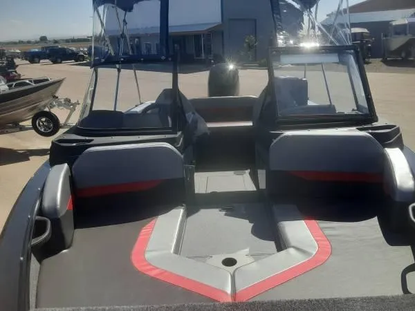 Slide: The Image of 2024 Princecraft Sport 175 MAX boat interior with seating and windshield. - 5