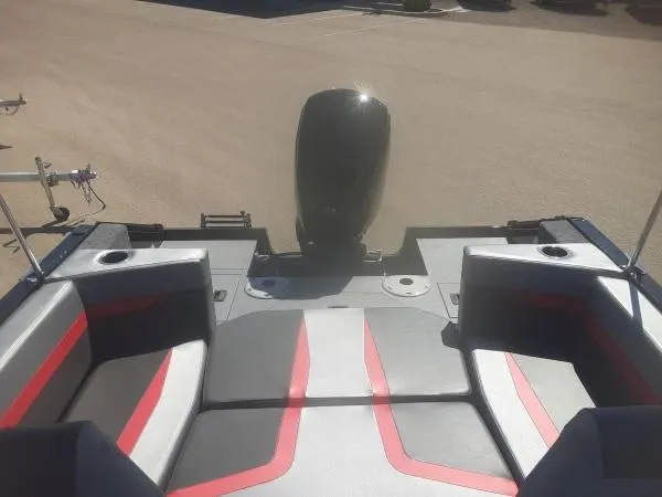 Slide: The Image of 2024 Princecraft Sport 175 MAX boat interior with seating and motor. - 7