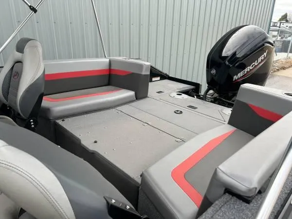 Slide: The Image of 2024 Princecraft Sport 175 MAX boat interior with Mercury engine, gray and red seating. - 8