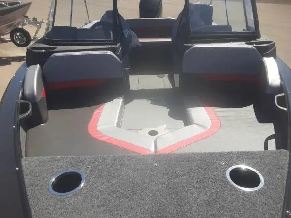 Slide: The Image of 2024 Princecraft Sport 175 MAX boat interior with seating and cup holders. - 9