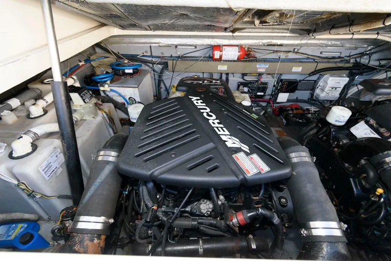 Slide: The Image of Engine room of 2001 Sea Ray 340 Amberjack with Mercury engine. - 19