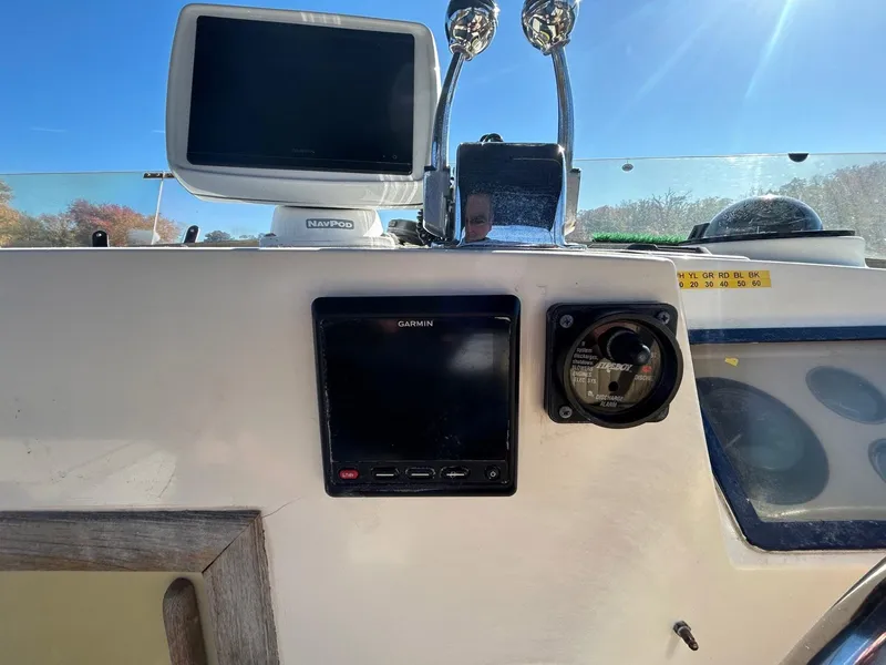 Slide: The Image of Dashboard of 1986 Grand Banks 42 Classic with navigation equipment. - 15