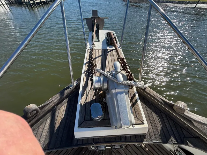 Slide: The Image of Grand Banks 42 Classic 1986 yacht bow with anchor and chain on deck. - 22