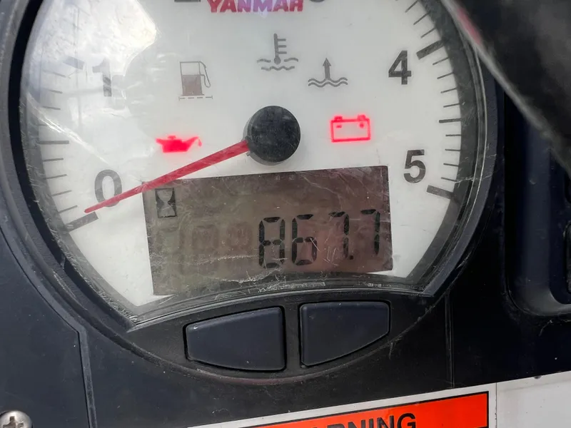 Slide: The Image of Yanmar engine gauge on 2019 Beneteau Oceanis 35.1 displaying 867.7 hours. - 11
