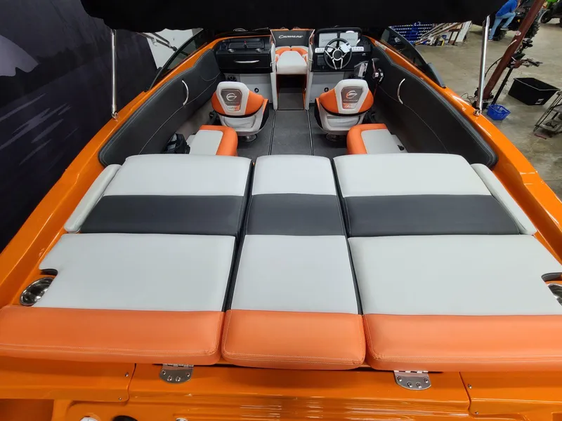 Slide: The Image of 2024 Crownline 240 SS LPX boat interior with orange and gray seating. - 10