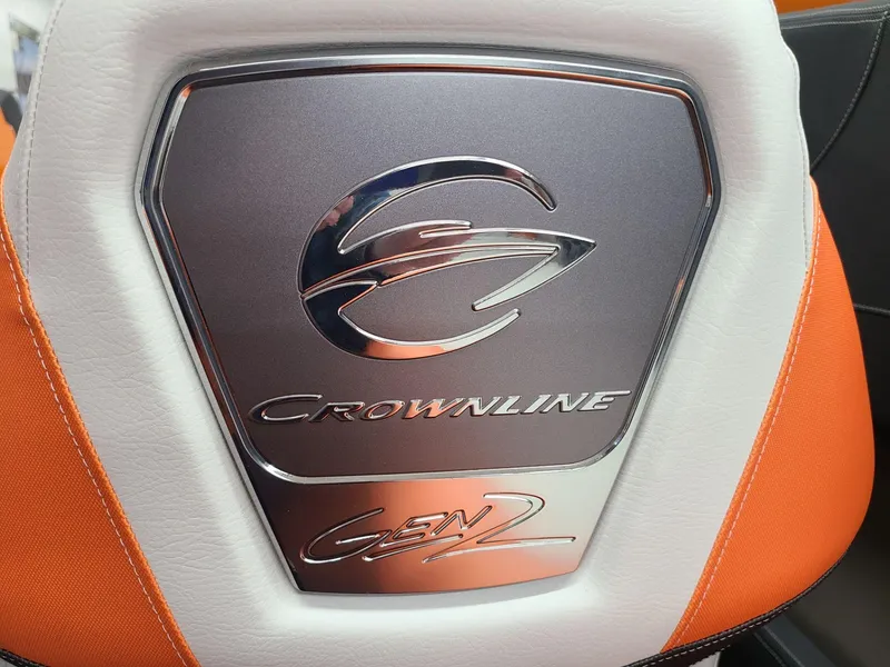 Slide: The Image of 2024 Crownline 240 SS LPX seat with logo and Gen 2 emblem. - 13