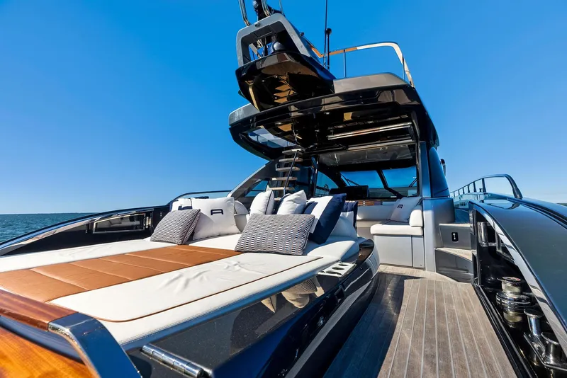 Slide: The Image of Luxurious 2020 Riva 66' Ribelle yacht with elegant deck and seating area. - 43