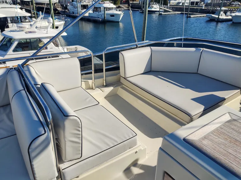 Slide: The Image of Blue flybridge sun pad converted to benches - 80