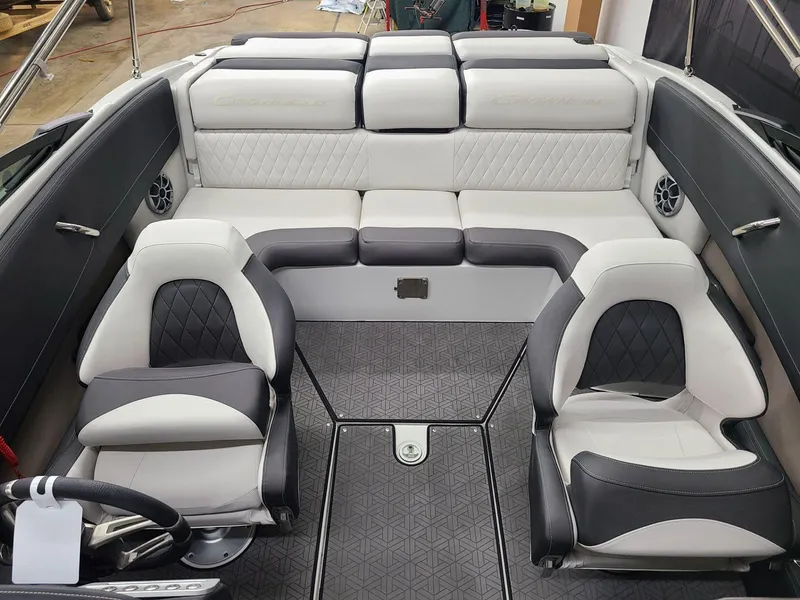 Slide: The Image of 2024 Crownline 220 SS LPX boat interior with sleek, modern seating and stylish design. - 12