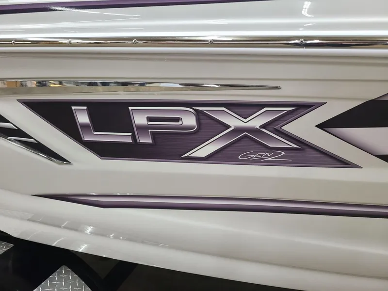 Slide: The Image of 2024 Crownline 220 SS LPX boat logo detail with sleek design. - 5