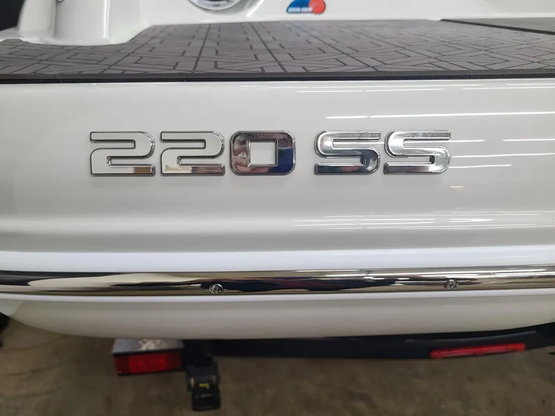Slide: The Image of 2024 Crownline 220 SS LPX boat rear view with chrome lettering. - 6