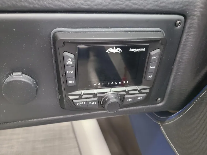 Slide: The Image of 2024 Crownline 210 SS boat audio control panel with Wet Sounds system. - 12