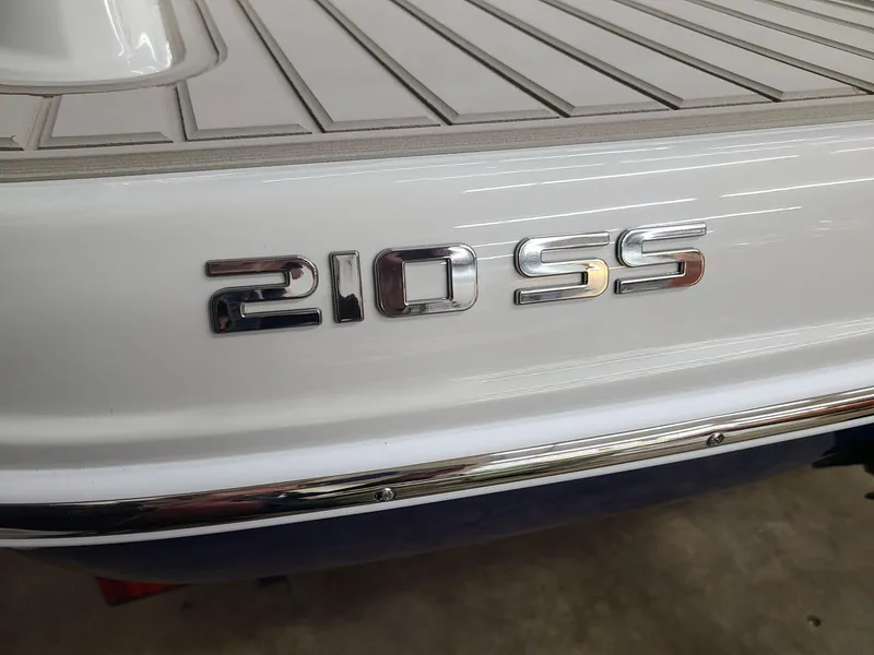 Slide: The Image of 2024 Crownline 210 SS boat rear view with model nameplate. - 5