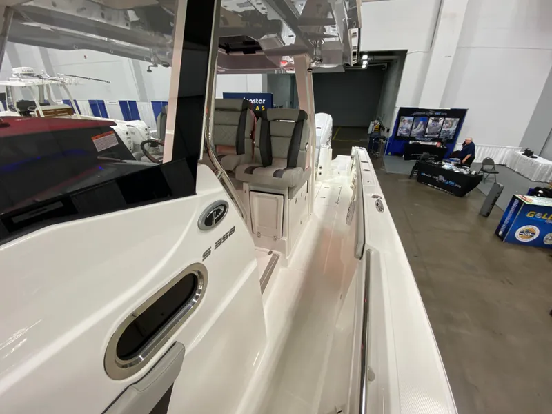 Slide: The Image of 2024 Pursuit S 358 boat interior at a marine exhibition. - 16