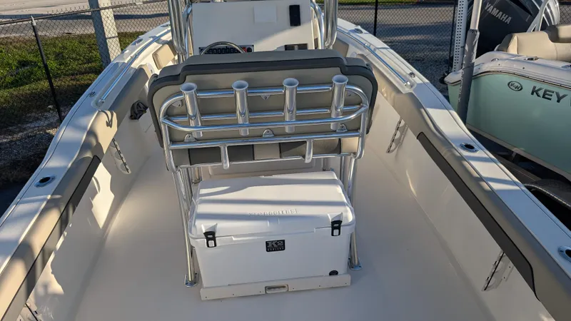 Slide: The Image of 2025 Key West 239 FS boat interior with seating and storage. - 12