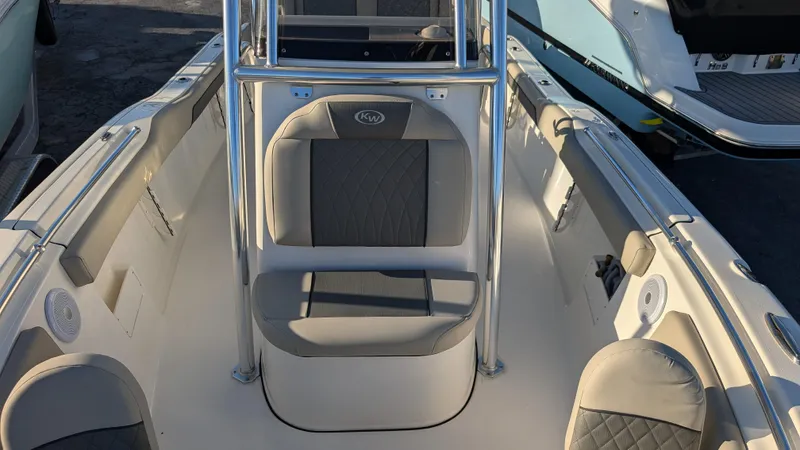 Slide: The Image of 2025 Key West 239 FS boat interior with seating and console. - 15