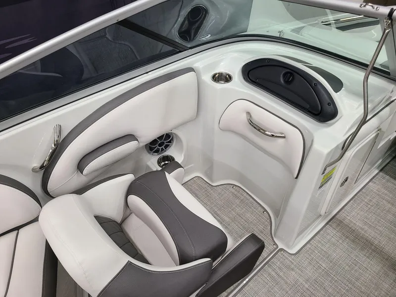 Slide: The Image of 2024 Crownline Eclipse E220 XS boat interior with sleek seating and modern design. - 12