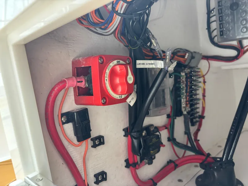 Slide: The Image of Electrical wiring and components inside a Vtech 18 FLATS 2024 model. - 25