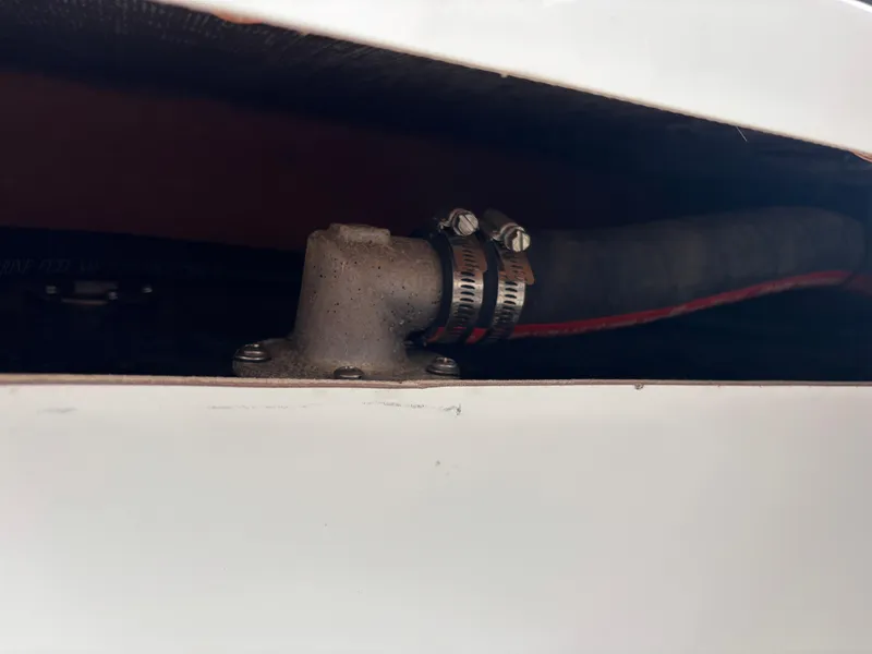 Slide: The Image of Close-up of a Vtech 18 FLATS 2024 pipe connection with clamps. - 38